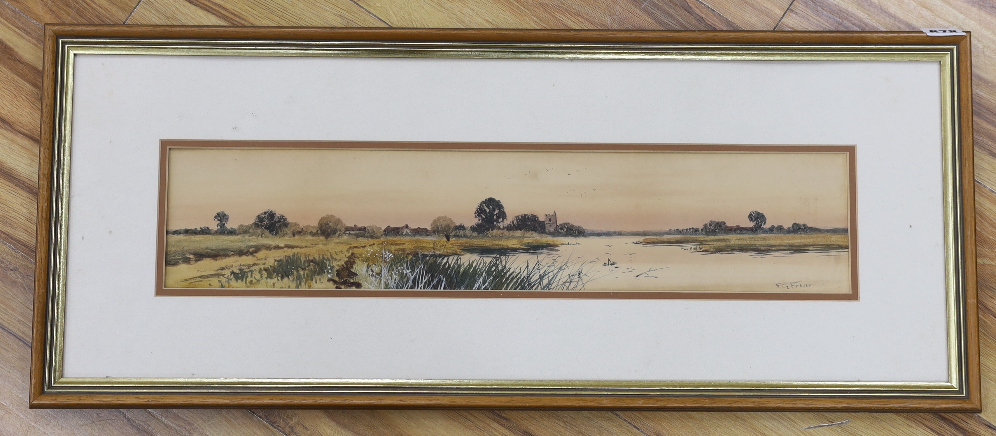 Frederick Gordon Fraser (1879-1931), watercolour, church among the Fens, signed, 11 x 54cm